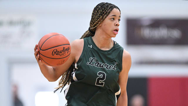 Laurel's Saniyah Hall brings the ball up the floor against Purcell Marian on January 16, 2023.